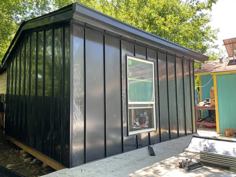 Black standing seam metal wall panels for Metal Roof Installation in Ontario